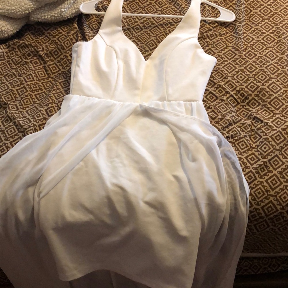 Dress with skit and high low back see through